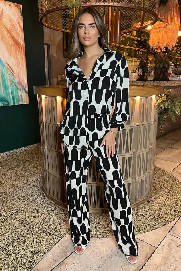 AX Paris Black And Cream Printed Geometric Trousers Women Trousers and Leggings
