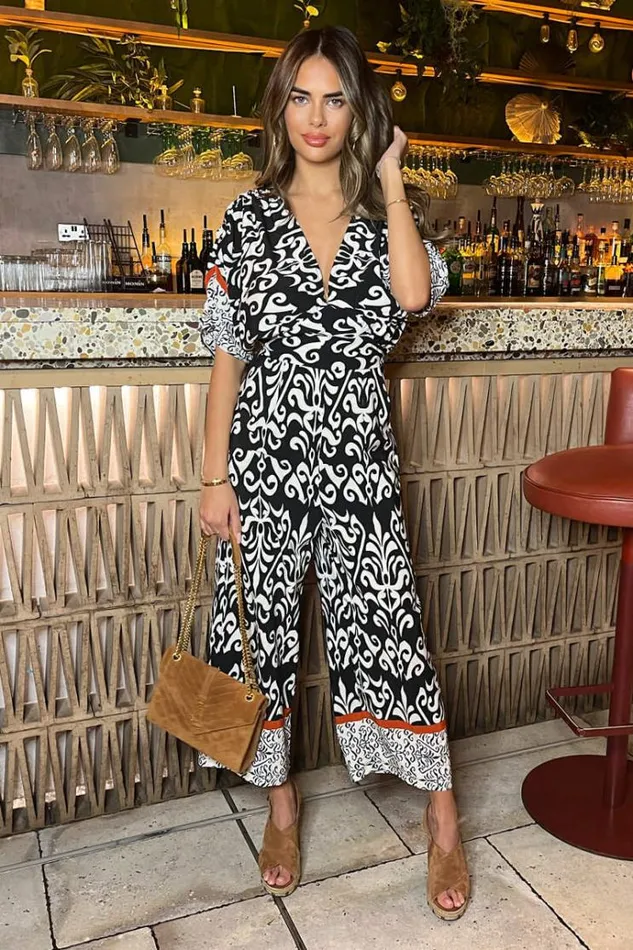 AX Paris Black And Cream VNeck Jumpsuit Women Jumpsuits And Playsuits
