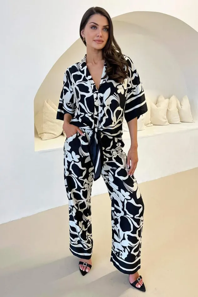 AX Paris Black And White Abstract Printed Trousers Women Trousers and Leggings