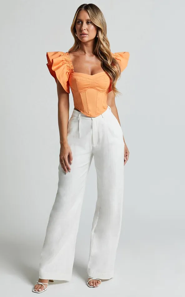 Showpo Charon Top 8211 Flutter Sleeve Corset Top In Sherbet Women Tops