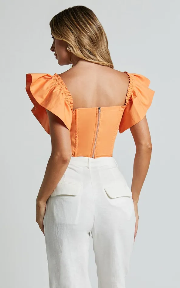 Showpo Charon Top 8211 Flutter Sleeve Corset Top In Sherbet Women Tops