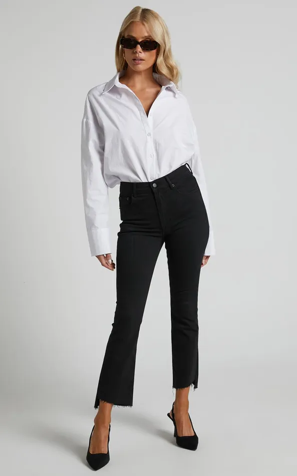 Showpo Elizena Jeans 8211 Mid Rise Step Hem Cropped Denim Jeans In Black Women Curve Clothes