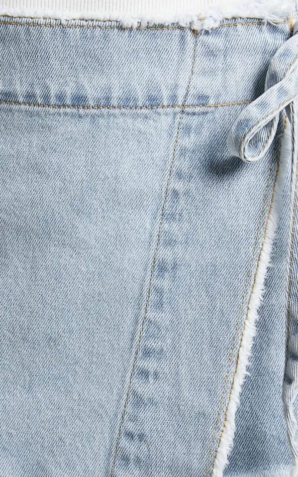 Showpo Ellyza Skort 8211 Recycled Cotton Frayed Edge Wrap Denim Skort In Mid Blue Wash Women Shop Conscious
