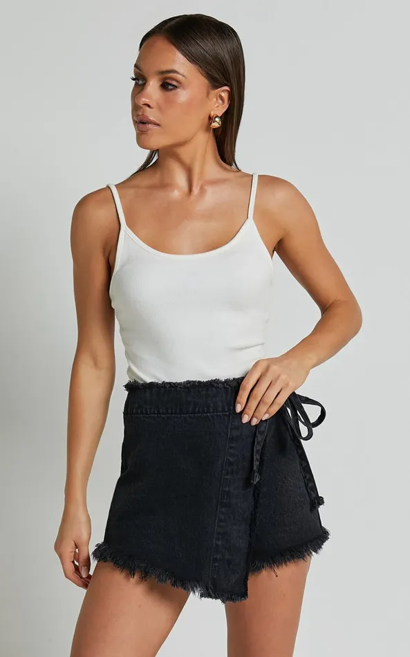 Showpo Ellyza Skort 8211 Recycled Cotton Frayed Edge Wrap Denim Skort In Washed Black Women Denim