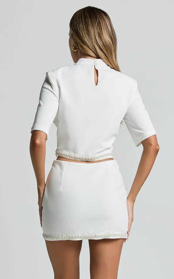 Showpo Jaden Two Piece Set 8211 High Neck Crop Top And Pearl Trim Detail Mini Skirt Set In White Women Dresses