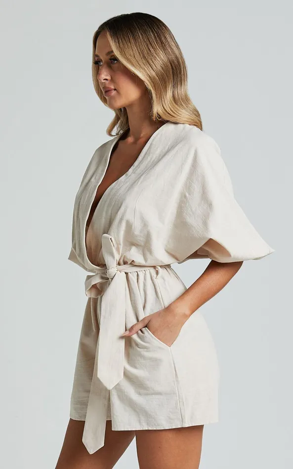 Showpo Kiro Playsuit 8211 Linen Look V Neck Puff Sleeve Tie Waist Playsuit In Biscuit Women Shop Conscious