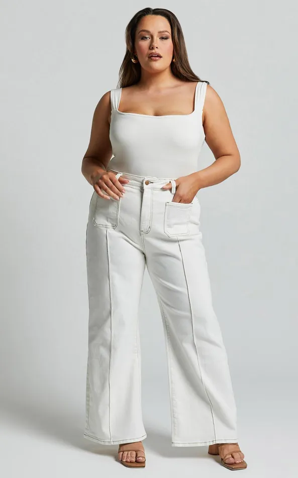 Showpo Malcolm Jeans 8211 Mid Rise Contrast Stitch Flared Denim Jeans In White Denim Women Curve Clothes