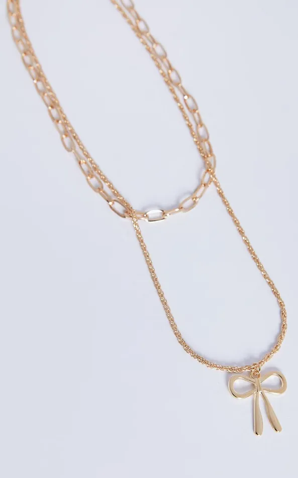 Showpo Natalie Necklace 8211 Bow Shaped Chain Layered Necklace In Gold Women Necklaces