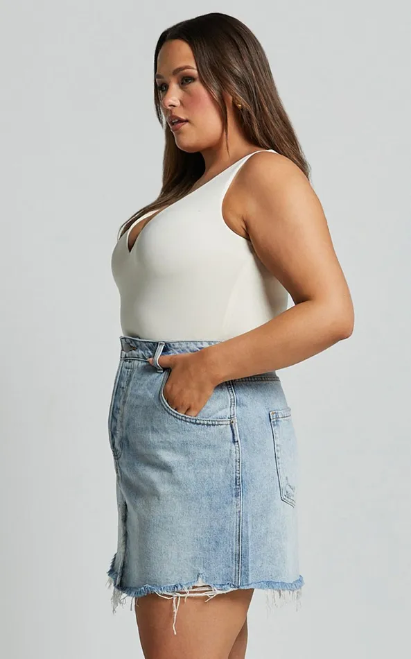 Showpo Pieta Mini Skirt 8211 Recycled Cotton Raw Hem Denim Skirt In Mid Blue Wash Women Curve Clothes